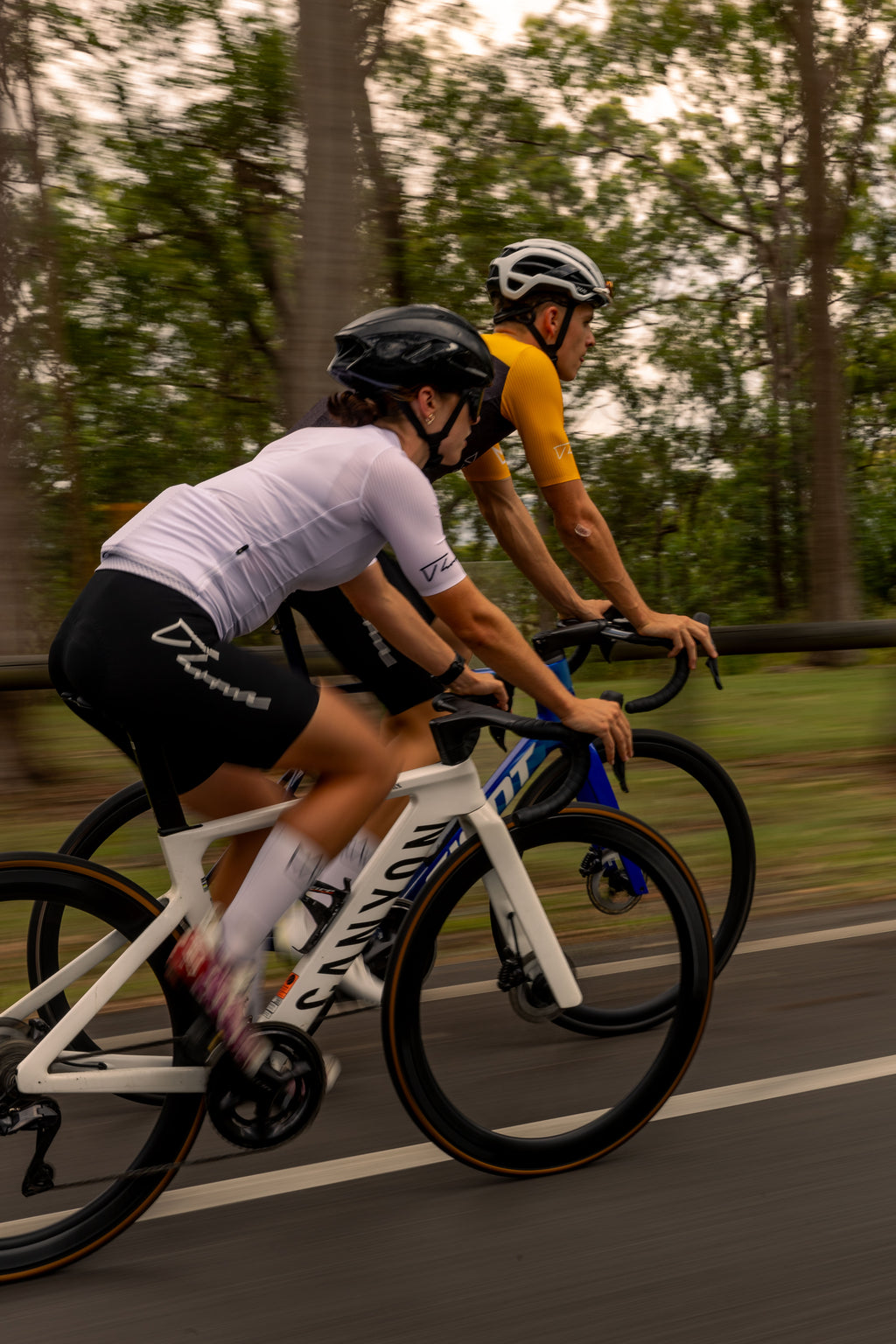 Woman wearing THRONE Phase 1 black cycling bib shorts