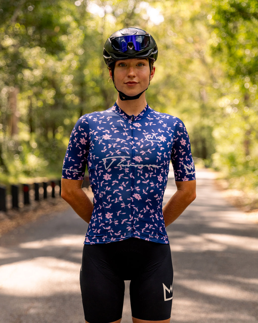 Woman wearing THRONE Phase 1 Abby purple cycling jersey