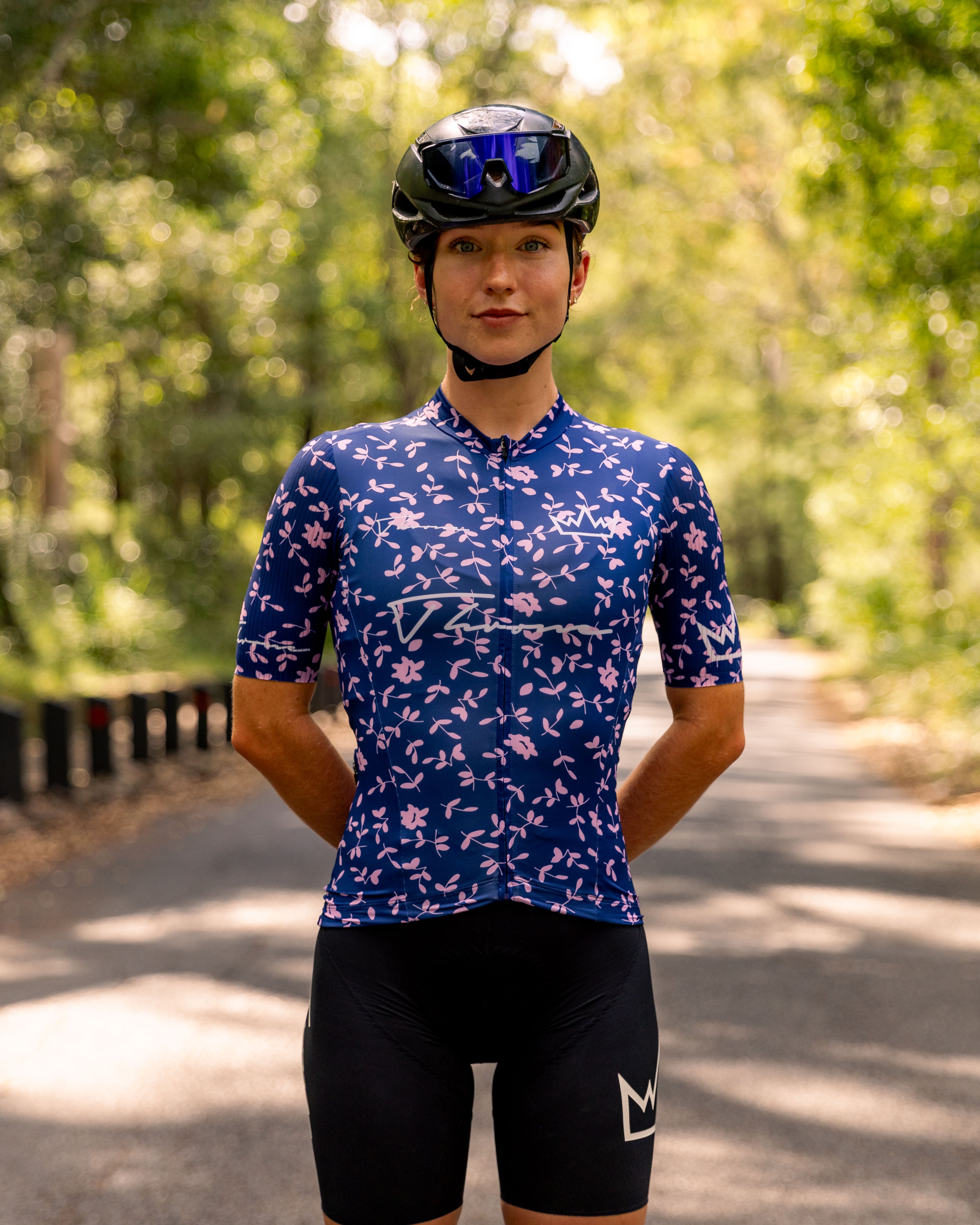 Woman wearing THRONE Phase 1 Abby purple cycling jersey