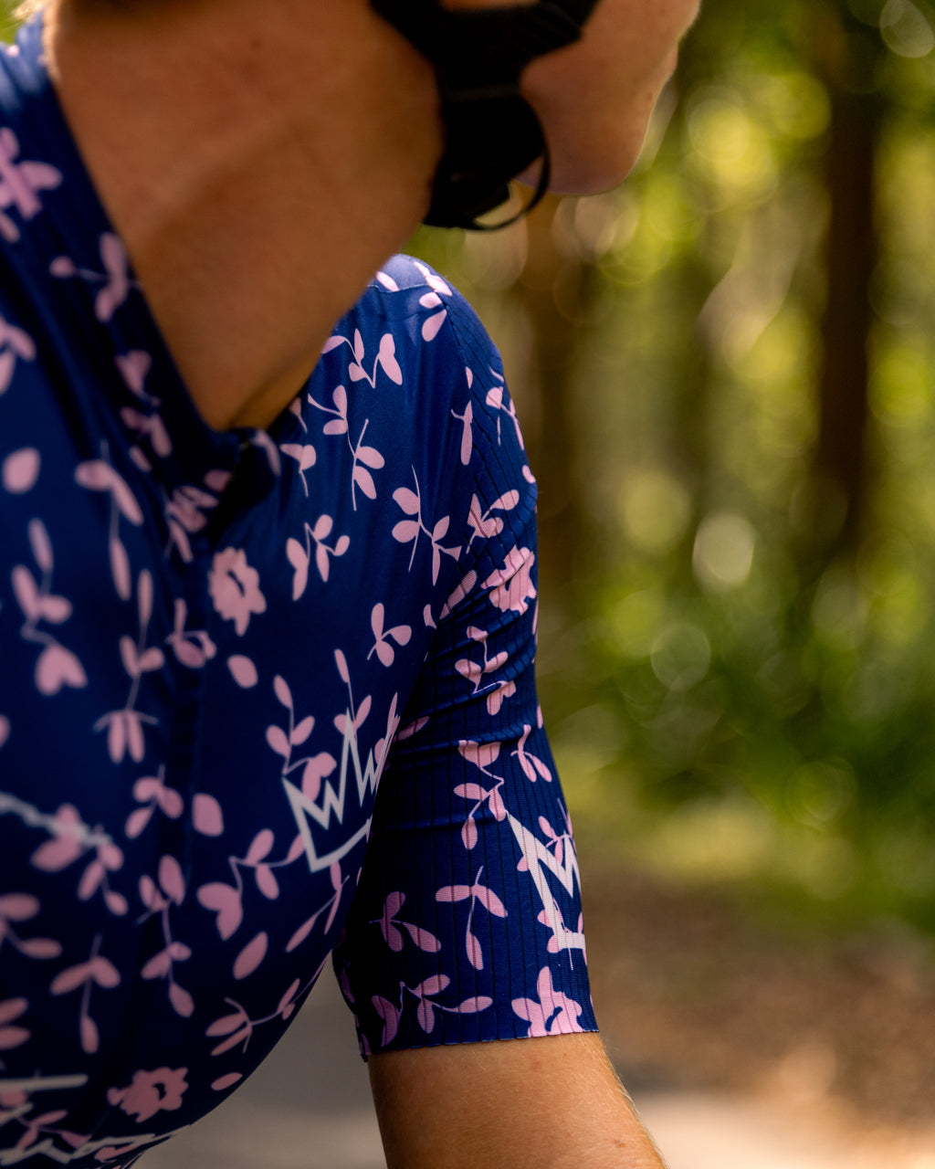 Woman wearing THRONE Phase 1 Abby purple cycling jersey