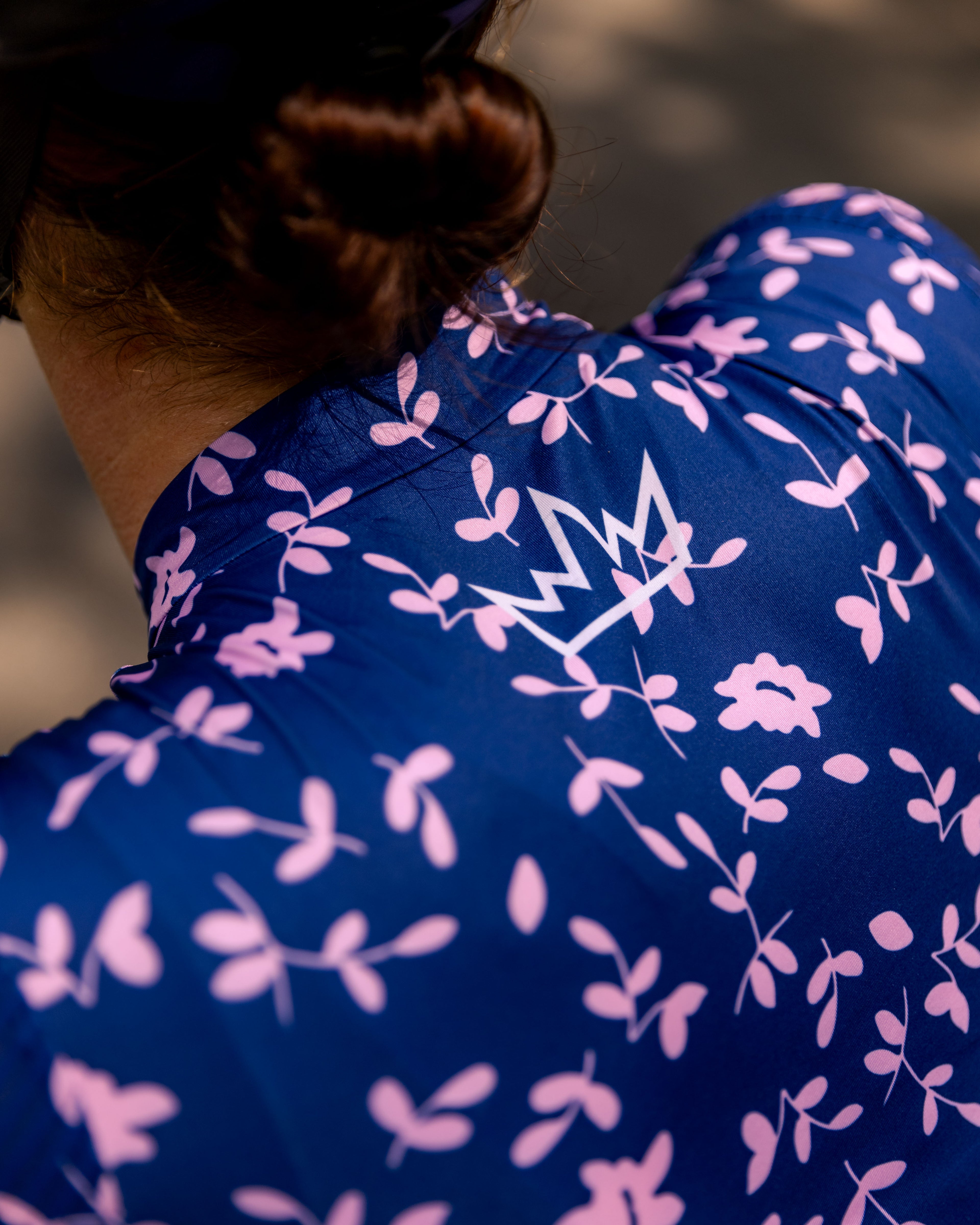 Woman wearing THRONE Phase 1 Abby purple cycling jersey