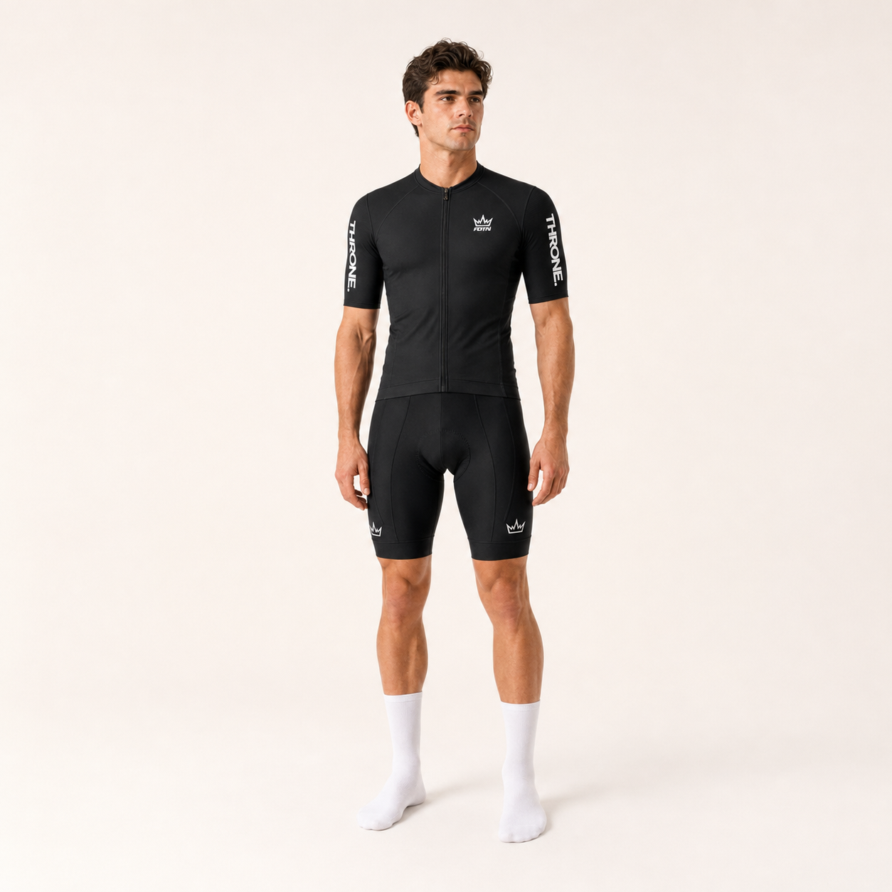 THRONE Men's Foundation Set in black, model wearing black Foundation jersey and black bib shorts
