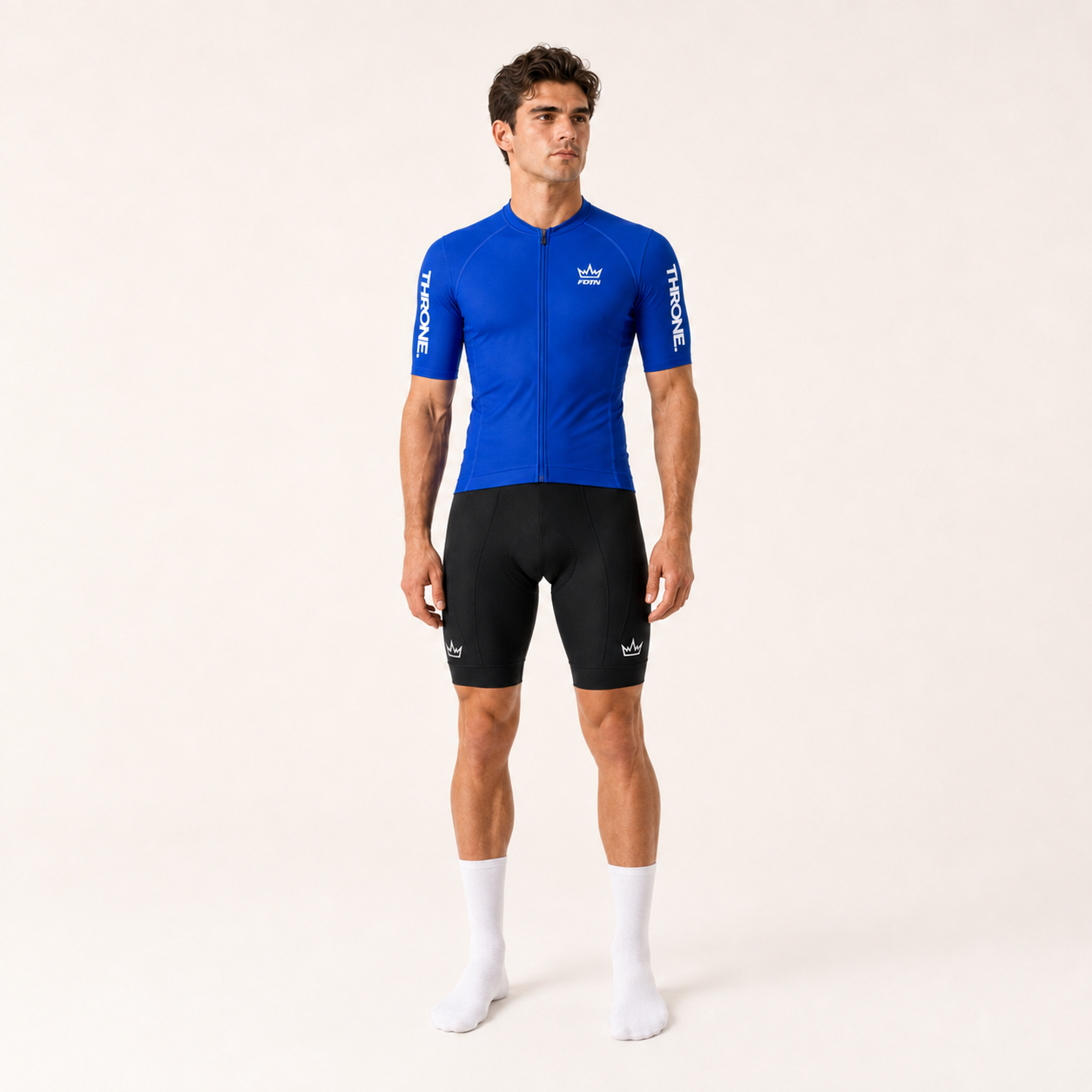 THRONE Men's Foundation Set in blue, model wearing blue Foundation jersey and black bib shorts