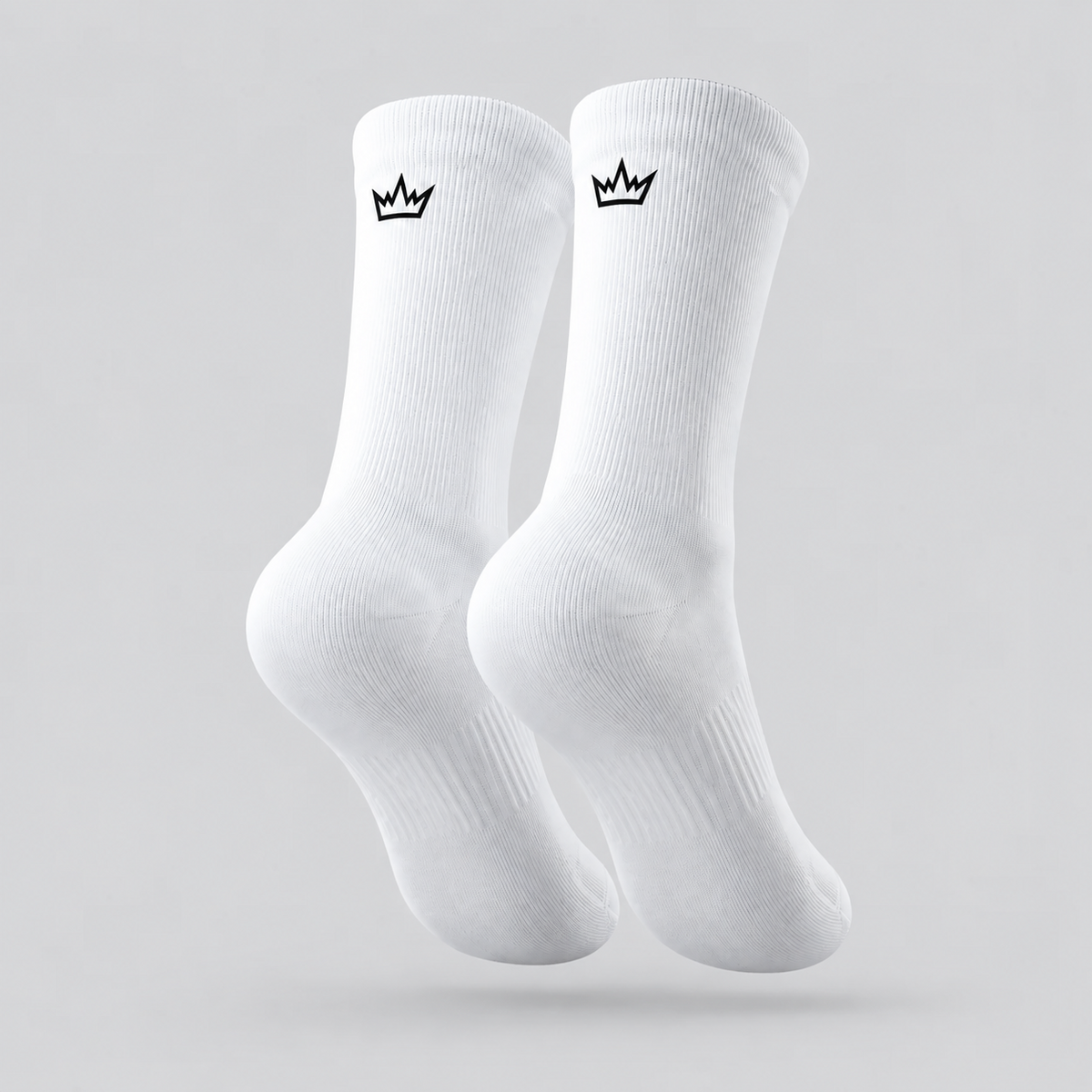 FDTN white cycling socks with crown branding on the back