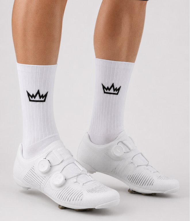 THRONE Aero Socks in white worn with white cycling shoes, black crown branding visible