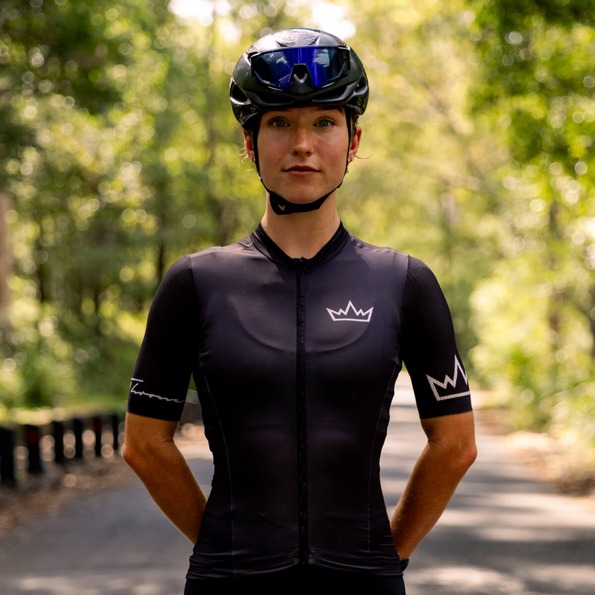 Woman wearing THRONE Phase 1 black cycling jersey
